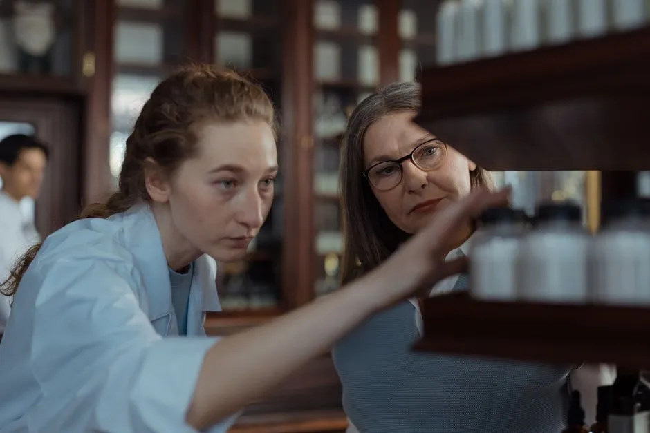 Pharmacy shelves stocked with medicine bottles